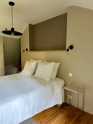 Un ou plusieurs lits dans un hébergement de l'établissement Gîte Le Four à Pain 6 personnes sur le domaine du Manoir du Rigouneix