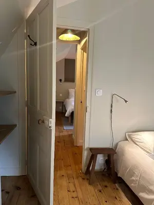 Un ou plusieurs lits dans un hébergement de l'établissement Gîte Le Four à Pain 6 personnes sur le domaine du Manoir du Rigouneix