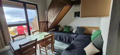 Coin salon dans l'établissement Village Montanha Lioran