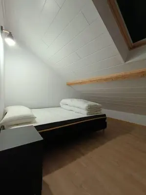Un ou plusieurs lits dans un hébergement de l'établissement # Le Beffroi# Maison# Murol