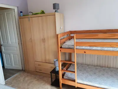 Un ou plusieurs lits dans un hébergement de l'établissement Villa Géraniums apt 4
