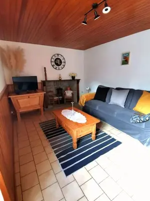 Coin salon dans l'établissement Maison Chez la Malie
