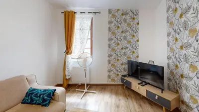 Télévision ou salle de divertissement dans l'établissement Hyper Centre Avec Terrasse