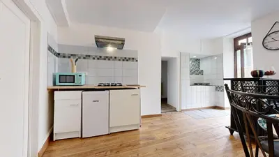 Cuisine ou kitchenette dans l'établissement Hyper Centre Avec Terrasse