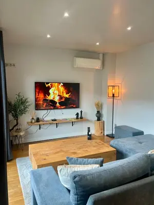 Télévision ou salle de divertissement dans l'établissement Casa Jouvenel -T3 3 pers -Brive-Parking privatif