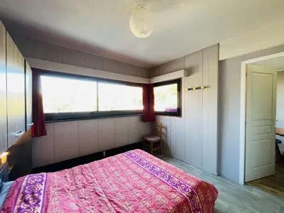 Un ou plusieurs lits dans un hébergement de l'établissement Appartement Mont-Dore avec Parking Privé - 4 pers - FR-1-608-257