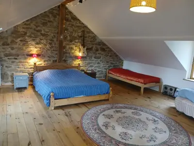 Un ou plusieurs lits dans un hébergement de l'établissement Charme en pleine nature