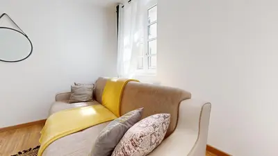 Coin salon dans l'établissement Cosy et Chic Centre Ville