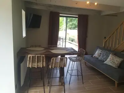 Coin salon dans l'établissement Gîte confortable à la campagne