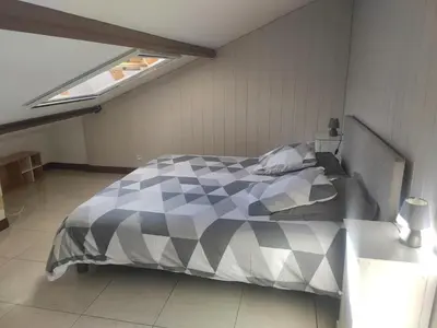 Un ou plusieurs lits dans un hébergement de l'établissement Petit gite paisible en bord de lac