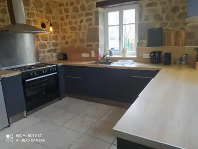Cuisine ou kitchenette dans l'établissement Le mas du Masrembaud