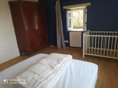 Un ou plusieurs lits dans un hébergement de l'établissement Le mas du Masrembaud