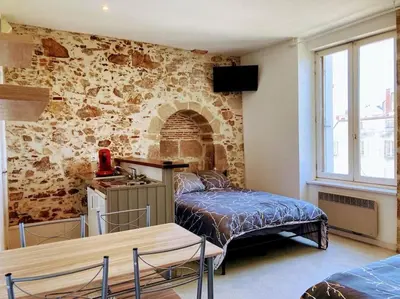 Un ou plusieurs lits dans un hébergement de l'établissement Appartement double dans le centre