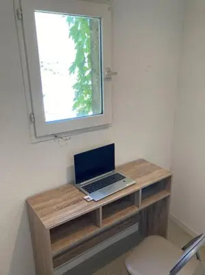 Télévision ou salle de divertissement dans l'établissement Appartement double dans le centre