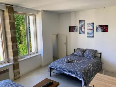 Un ou plusieurs lits dans un hébergement de l'établissement Appartement double dans le centre