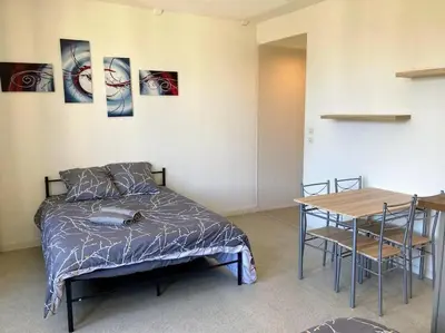 Un ou plusieurs lits dans un hébergement de l'établissement Appartement double dans le centre