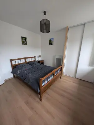 Un ou plusieurs lits dans un hébergement de l'établissement Maison agréable 4 à 6 pers