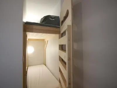 Télévision ou salle de divertissement dans l'établissement Bel appartement T3 avec terrasse et wifi au centre de La Bourboule - FR-1-608-270