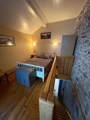 Un ou plusieurs lits dans un hébergement de l'établissement Petite maison avec cour fermée
