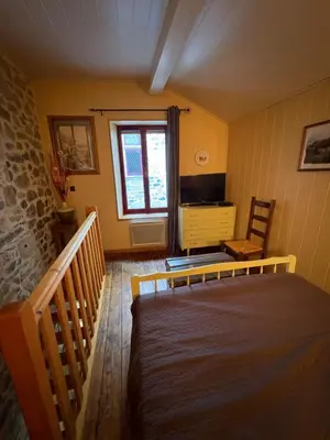 Un ou plusieurs lits dans un hébergement de l'établissement Petite maison avec cour fermée