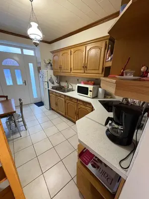 Cuisine ou kitchenette dans l'établissement Petite maison avec cour fermée