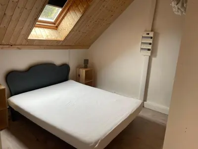 Un ou plusieurs lits dans un hébergement de l'établissement Appartement pour 8 personnes