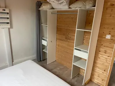 Un ou plusieurs lits dans un hébergement de l'établissement Appartement pour 8 personnes