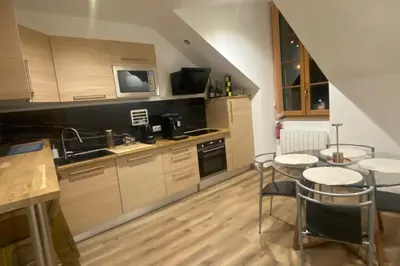 Cuisine ou kitchenette dans l'établissement 19A - Le Septième Ciel cocoon lover