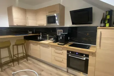 Cuisine ou kitchenette dans l'établissement 19A - Le Septième Ciel cocoon lover