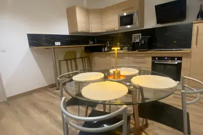 Cuisine ou kitchenette dans l'établissement 19A - Le Septième Ciel cocoon lover