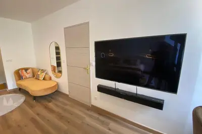Télévision ou salle de divertissement dans l'établissement 19A - Le Septième Ciel cocoon lover