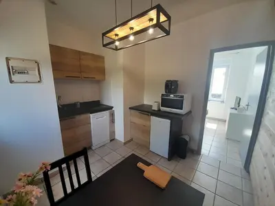 Cuisine ou kitchenette dans l'établissement gite de la fontaine