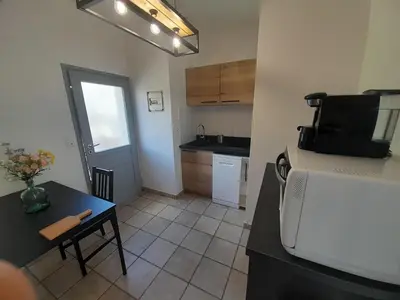 Cuisine ou kitchenette dans l'établissement gite de la fontaine