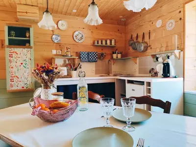 Cuisine ou kitchenette dans l'établissement Le Cottage