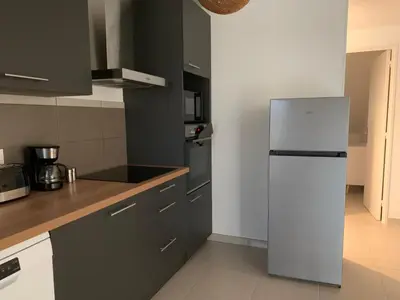 Cuisine ou kitchenette dans l'établissement Chez rose