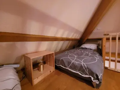 Un ou plusieurs lits dans un hébergement de l'établissement Gîte Les B