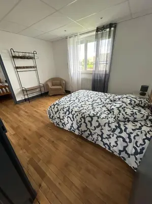 Un ou plusieurs lits dans un hébergement de l'établissement Maison le Ragean