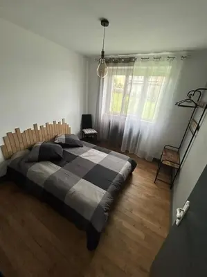 Un ou plusieurs lits dans un hébergement de l'établissement Maison le Ragean