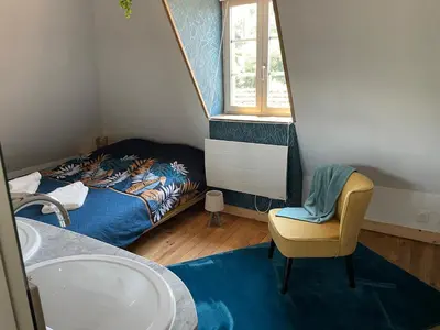 Un ou plusieurs lits dans un hébergement de l'établissement Maison de charme 7 personnes