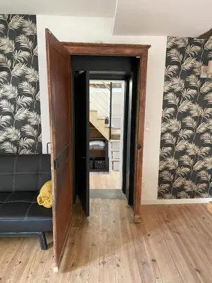 Coin salon dans l'établissement Maison de charme 7 personnes
