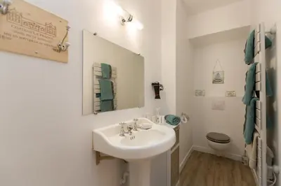 Salle de bains dans l'établissement Le Miel des Muses