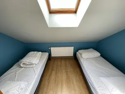 Un ou plusieurs lits dans un hébergement de l'établissement Duplex rénové 2 chambres, proche pistes, navette et gare, avec wifi et équipements complets - FR-1-787-4