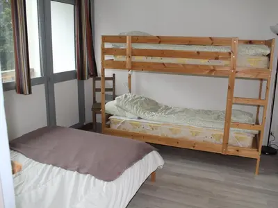 Un ou plusieurs lits dans un hébergement de l'établissement Bel appartement rénové T2 avec balcon au pied des pistes - FR-1-787-10