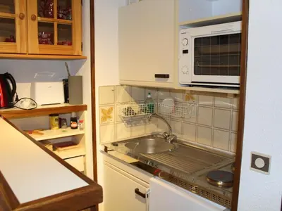 Cuisine ou kitchenette dans l'établissement Studio cabine cosy au pied des pistes, animaux acceptés - FR-1-787-9