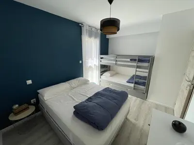 Un ou plusieurs lits dans un hébergement de l'établissement Charmant T3 Neuf avec Balcon, Face Télésiège et Navette Gratuite - FR-1-787-15
