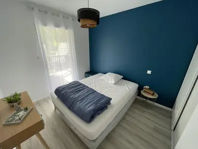 Un ou plusieurs lits dans un hébergement de l'établissement Charmant T3 Neuf avec Balcon, Face Télésiège et Navette Gratuite - FR-1-787-15