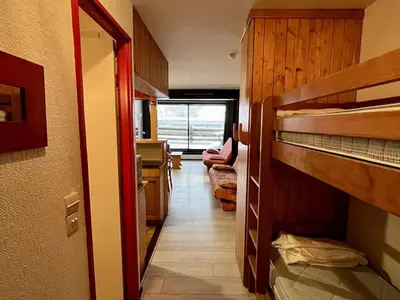 Un ou plusieurs lits dans un hébergement de l'établissement Charmant studio au coeur de la station, balçon exposé, idéal pour 4 personnes - FR-1-787-7