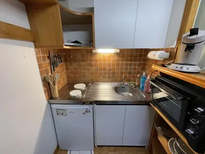 Cuisine ou kitchenette dans l'établissement Duplex au Lioran avec balcon, proche pistes et commerces - FR-1-787-25