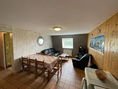 Coin salon dans l'établissement Appartement spacieux avec animaux admis et parking gratuit - FR-1-787-18