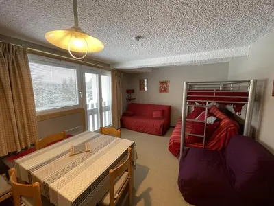 Un ou plusieurs lits dans un hébergement de l'établissement Studio confortable au pied des pistes, Le Lioran - FR-1-787-40
